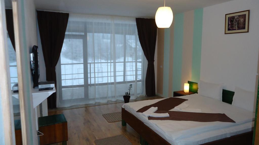 Ezio House Hotel Timisu de Jos Quarto foto